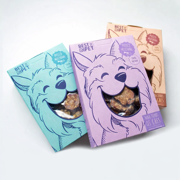 Dog treats packaging designed with a circular window showing the treats inside through a cartoon dog's mouth