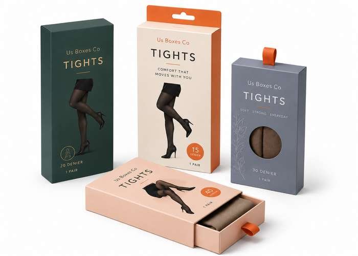 Elegant custom tights packaging in green, peach, and grey boxes with window cut-outs.
