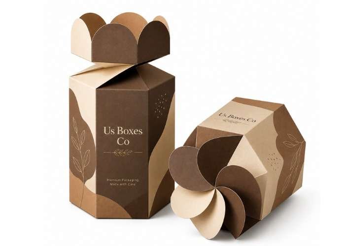 Two brown and beige decorative Twist Top Boxes with floral graphics and flower-shaped folding lids, one standing open and one lying on its side.