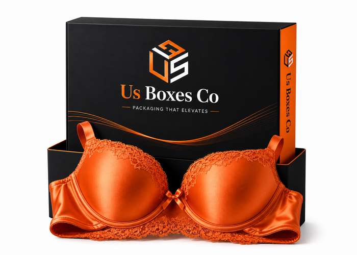 Orange bra in front of a black and orange packaging box.