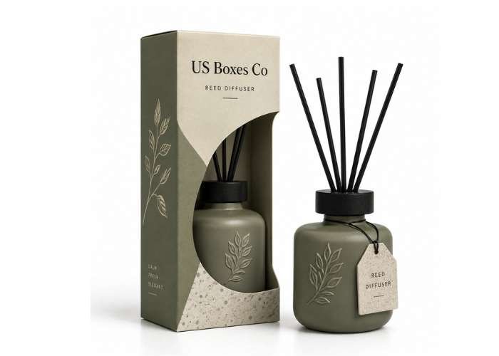 Olive green reed diffuser with matching box packaging on a white background.